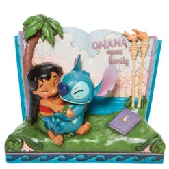 Enesco Jim Shore Disney Lilo & Stitch Storybook Figurine, 5.75"