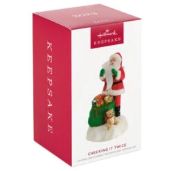 Hallmark Checking It Twice Ornament With Light And Sound 11 Hallmark Checking It Twice Ornament With Light And Sound -Stuffed Animals Shop Santa Checking His List Keepsake Ornament 2999QGO2657 04